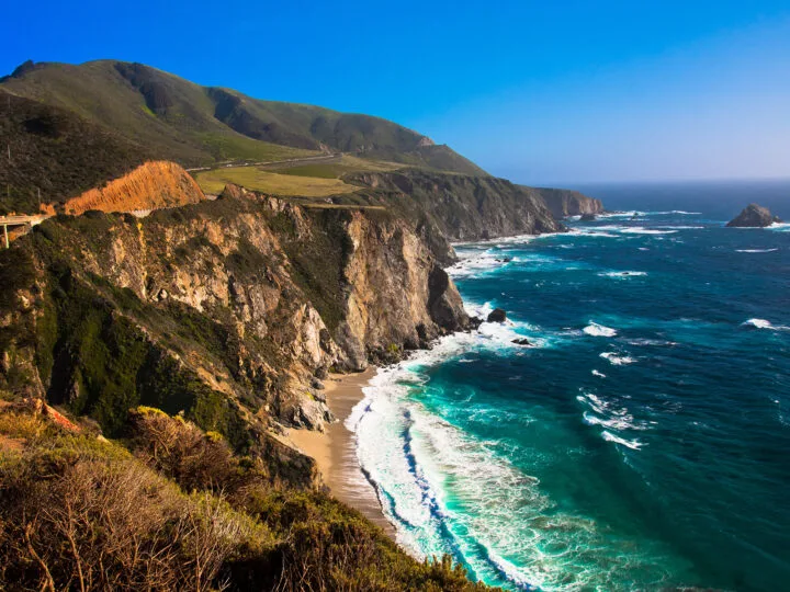 San Francisco to San Diego view of the california coast road trip ocean waves rocky shoreline and road in distance