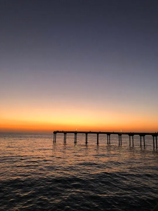 pacific coast highway stops sunset along pier