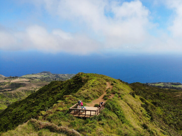 view of wooden platform at top of waihee ridge trail in Maui with ocean in distance