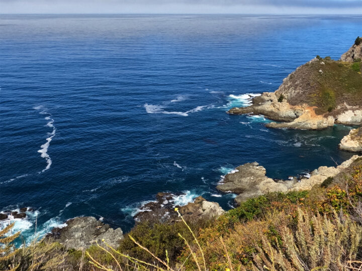 things to do in Big Sur view of the rocky coast and bright blue water