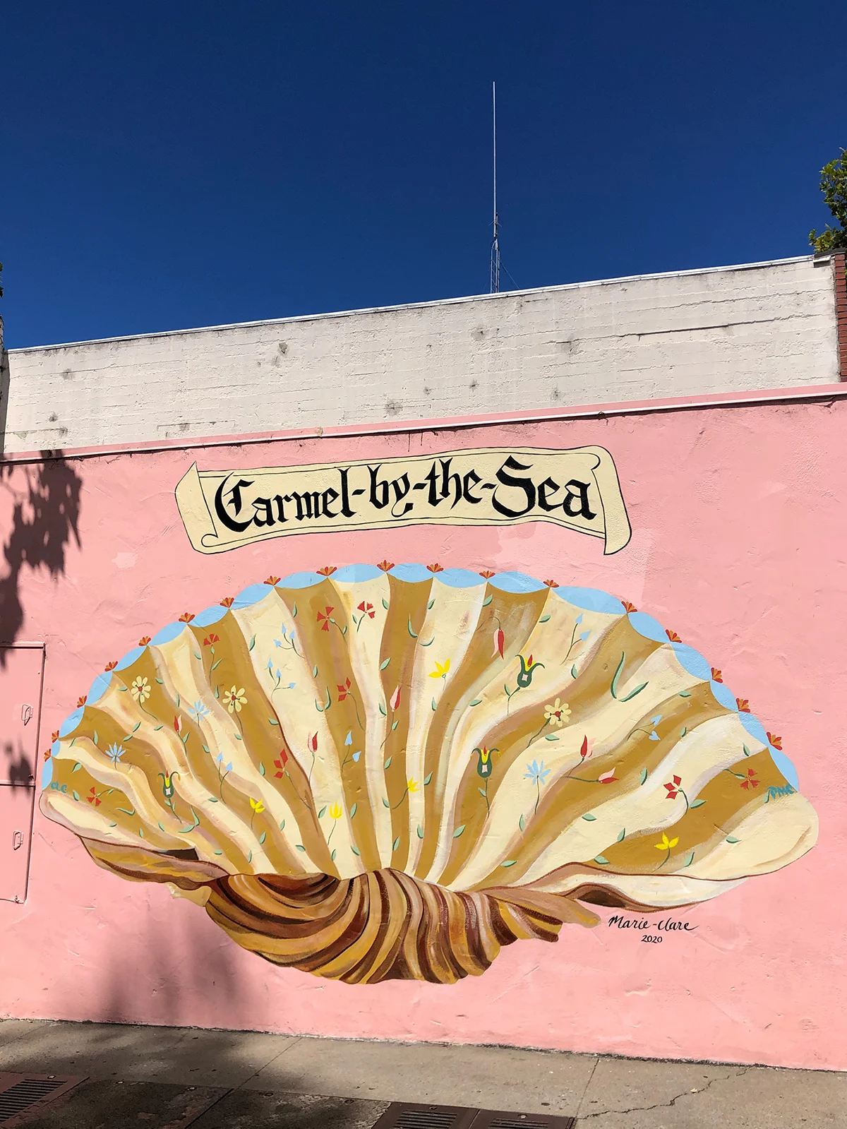 Carmel by the sea mural pink wall with seashell