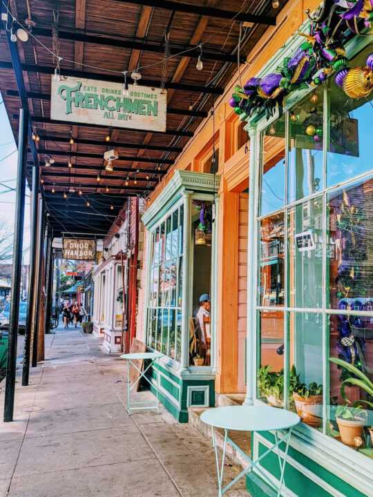 New Orleans storefront brightly colored with holiday decorations