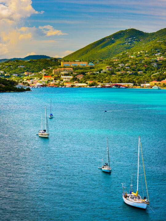 view of st Thomas USVI boats in harbor with island in distance
