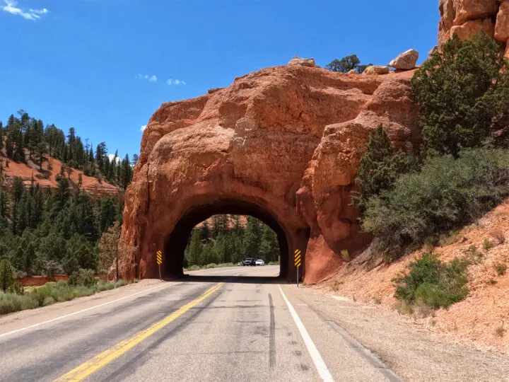 road with hole through rock