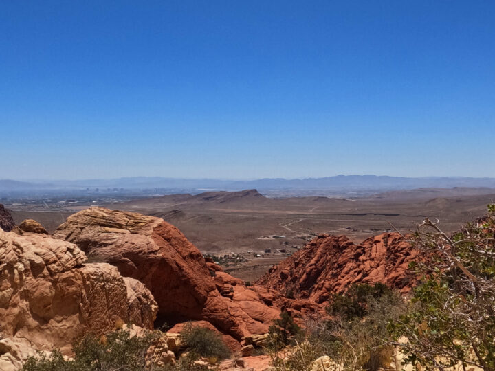 hike view of Las Vegas strip in distance from red rock scenic loop