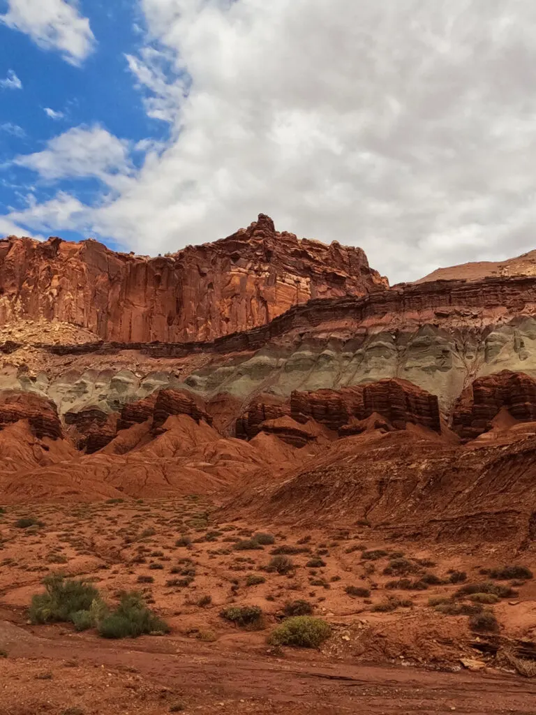 layered red orange and grey rocks on a Utah national parks itinerary