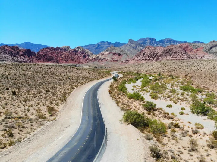 Red rock canyon scenic drive view of road from above curving into rocky cliffs