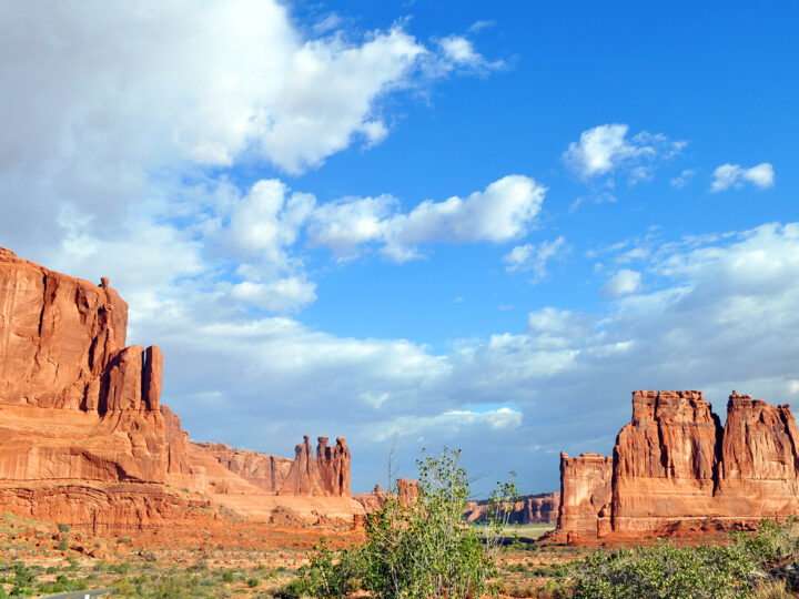 rocky scenery with blue sky orange spires on a Utah national parks road trip,