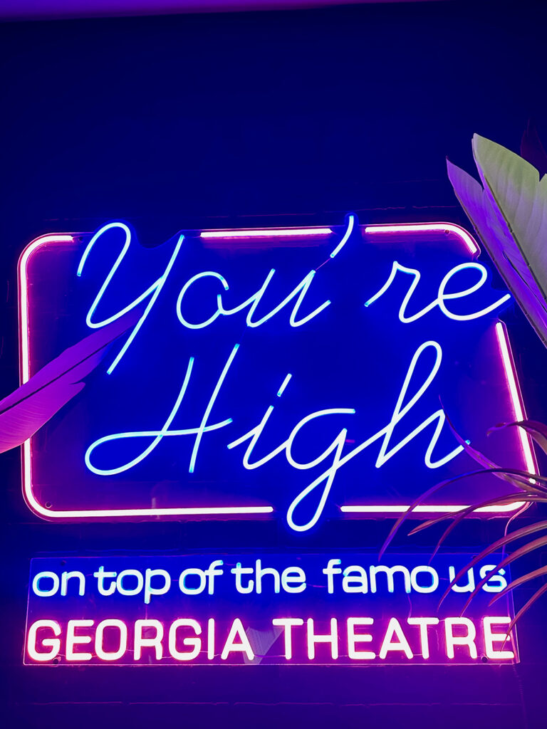 you're high on top of the famous Georgia theatre neon sign