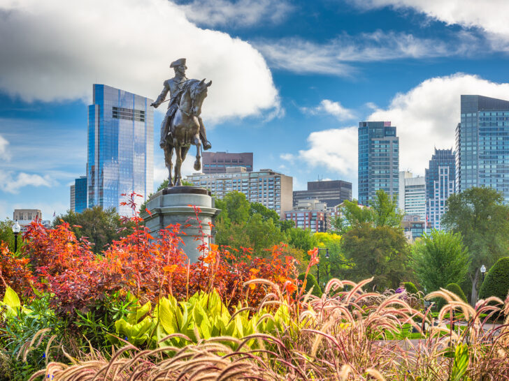 view of Boston skyline and statue during fall on rv road trip
