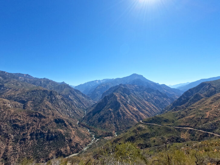 kings canyon california with river in canyon base road and mountain range