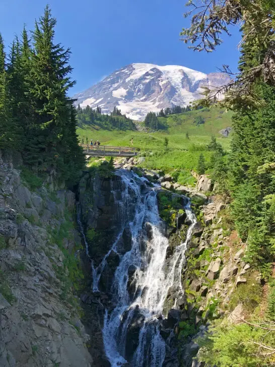 best mount rainier hikes with bridge above and mountain in distance