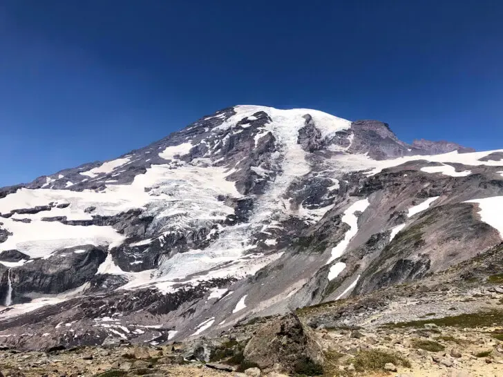 paradise hikes mt rainier up close view of mountain with snow and rocks on sunny day