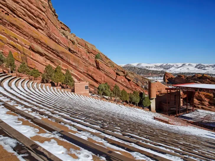 places to see in colorado view of red rock amphitheater benches and mountains