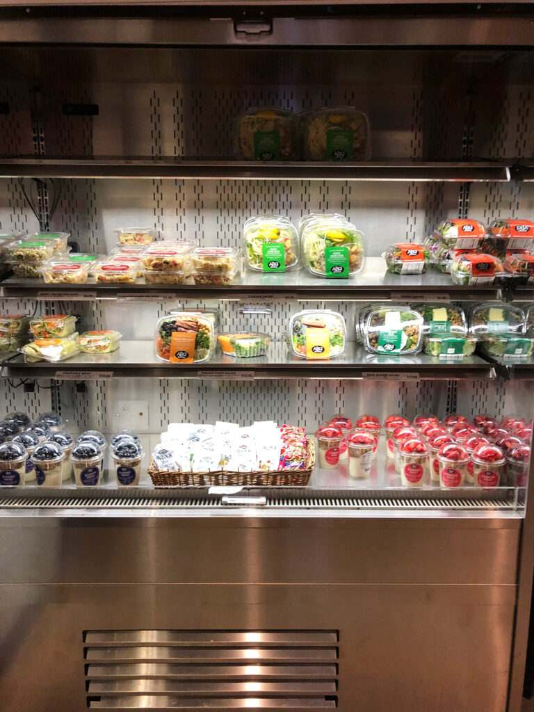 view of snacks inside mar rainier visitor center sandwiches and packages on shelves