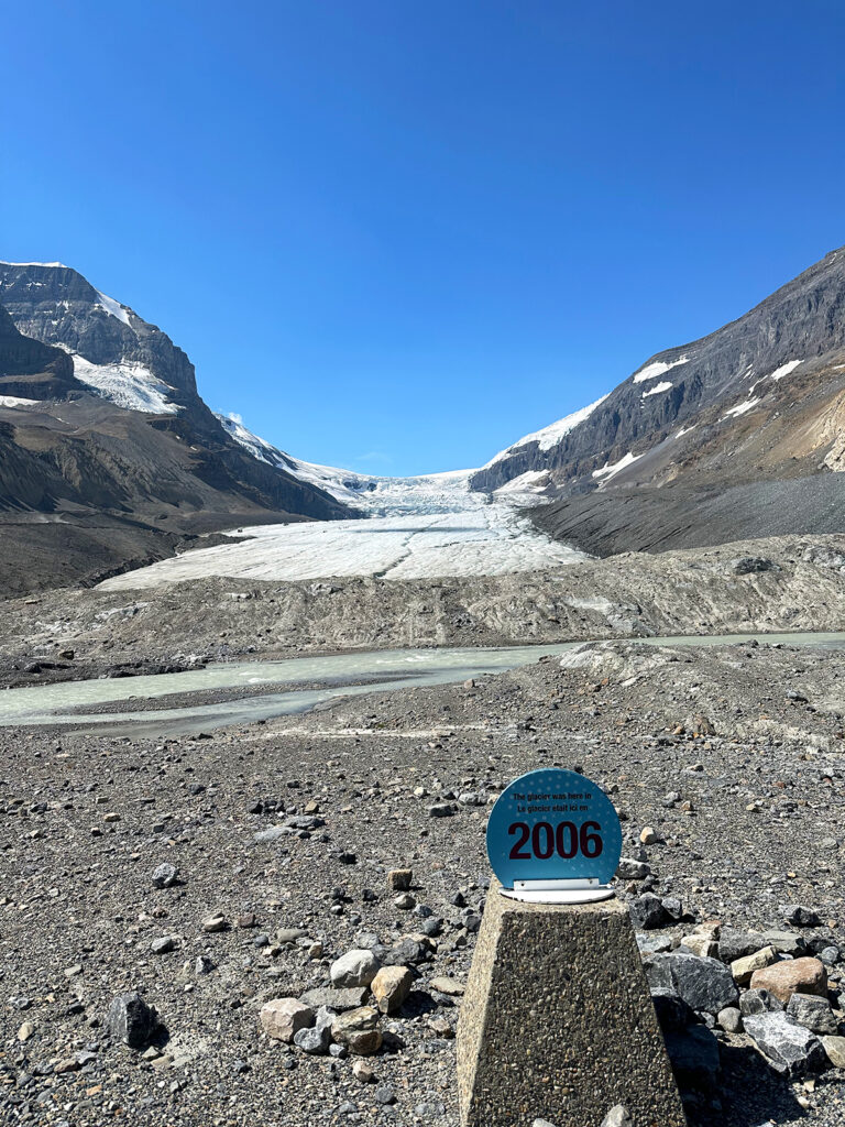 sign showing 2006 with snow melt and glacier that has melted