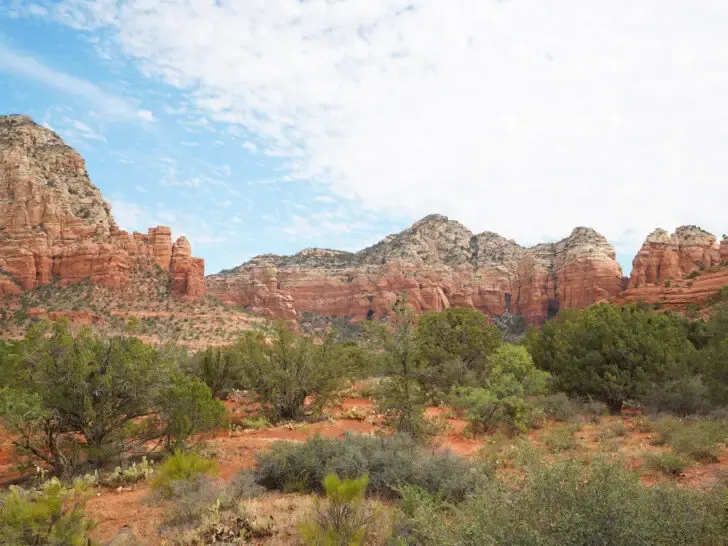 sedona red rock scene with trees view of warm places to visit in November in USA