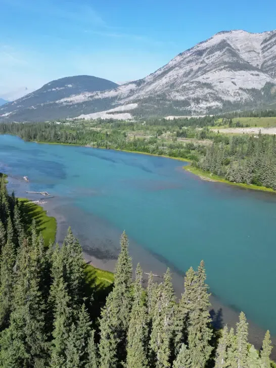 bright blue river and mountains in Alberta Canada