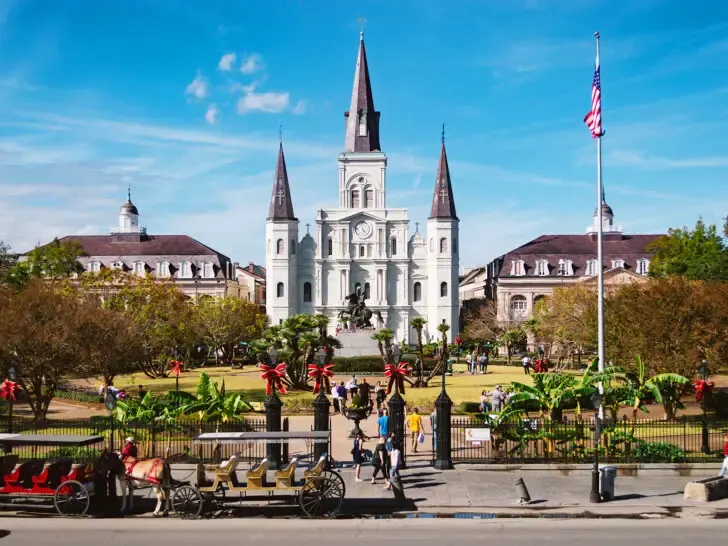 best places to visit in November USA view of large white church building with festive decor in New Orleans LA