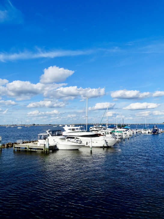 cheap warm winter vacations usa view of boats at harbor in water on sunny day