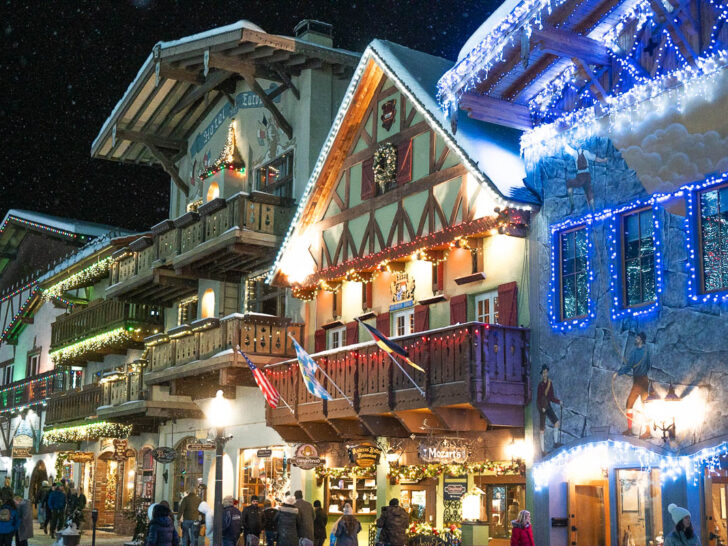winter road trips view of Leavenworth WA with cute downtown buildings decorated for Christmas