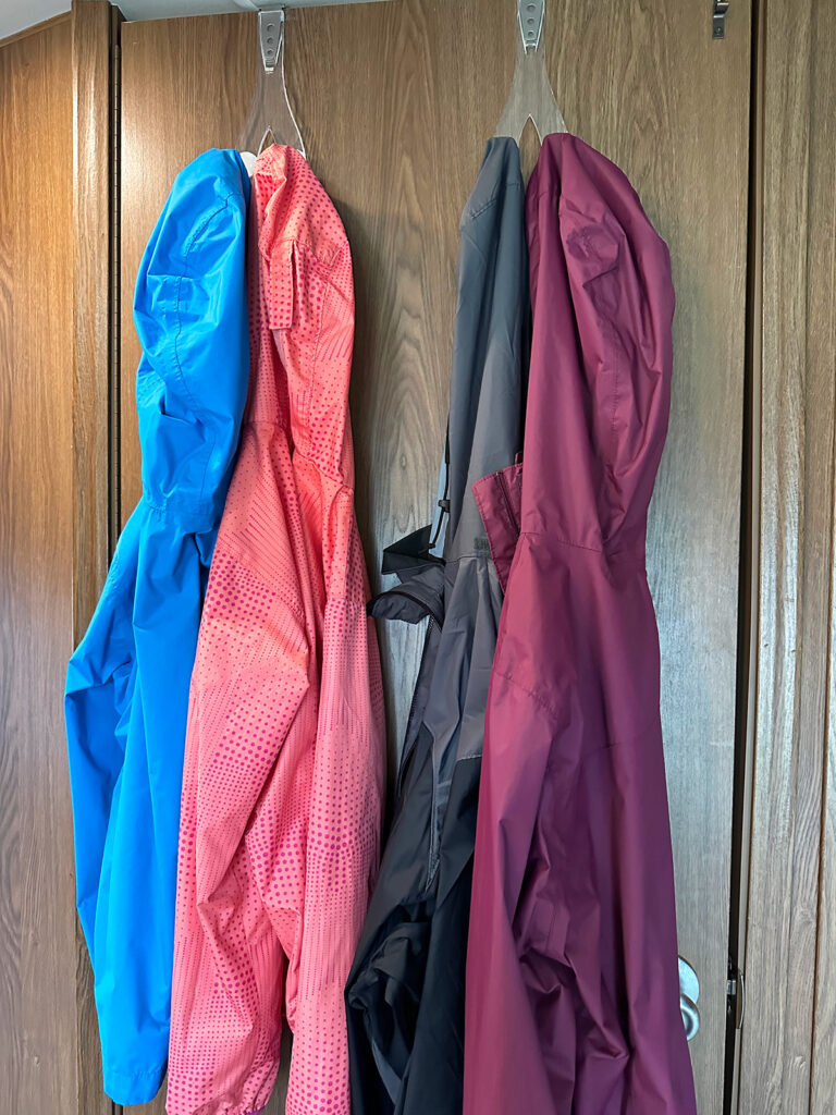 jackets hanging from over the door hook