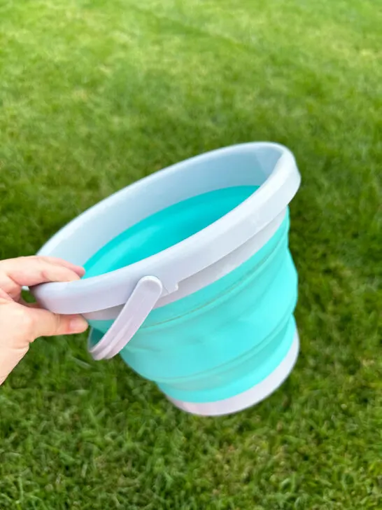 teal and gray collapsible bucket