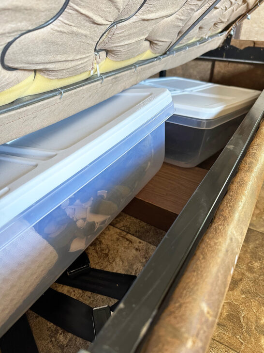 storage organization in campers under the couch tubs