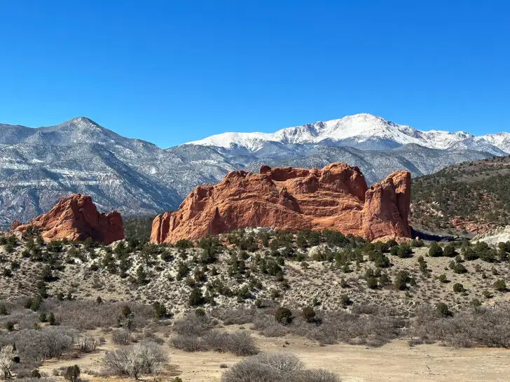 red Rocky Mountains with white mountains in distance colorado scenic drives